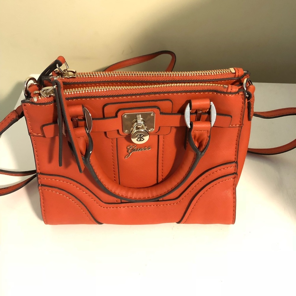 Brand new with the tag Gue$$ bag